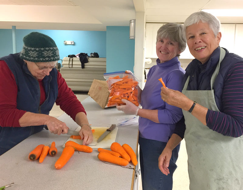 Community Senior Center member prepping meals
